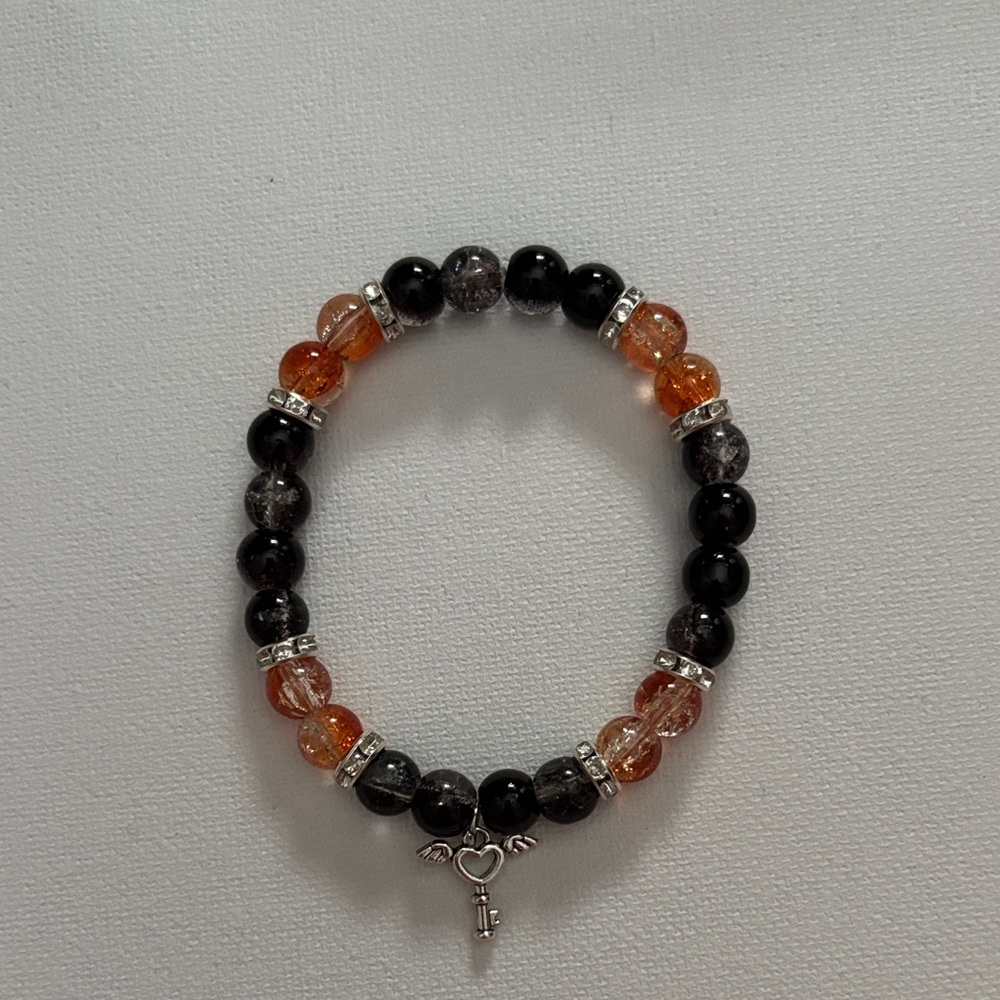 Elegant Black and Orange Beaded Bracelet